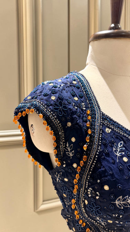 Embellished blouse with contrast tassels