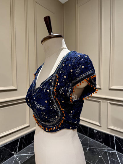 Embellished blouse with contrast tassels